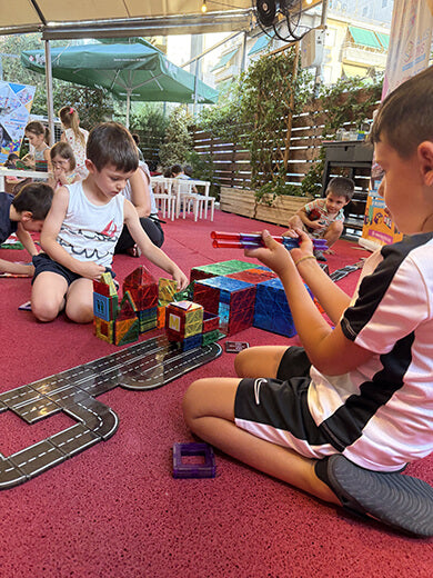 Children playing Playmags image 4